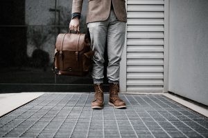 leather backpack and boots close up 300x200 - تمام کاربردهای یک کیف و کوله پشتی چرم طبیعی